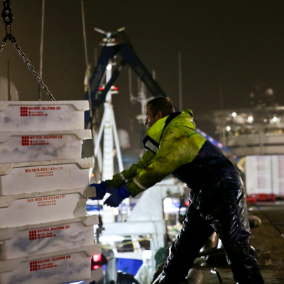 Fisherman unloading fish at the dock